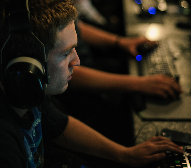 Focused gamer wearing a headset